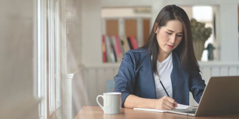 Blog woman in blue jacket sitting on chair 3740558 768x382
