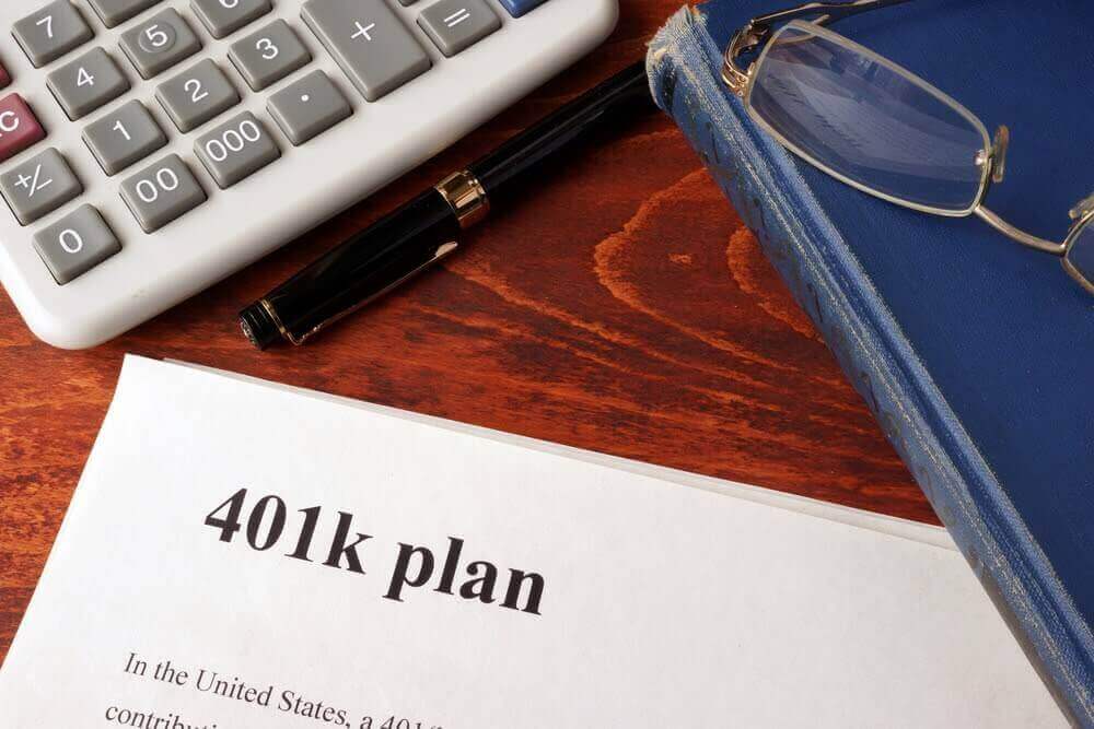Paper with the words "401k plan" on it