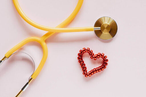 Yellow stethoscope on table