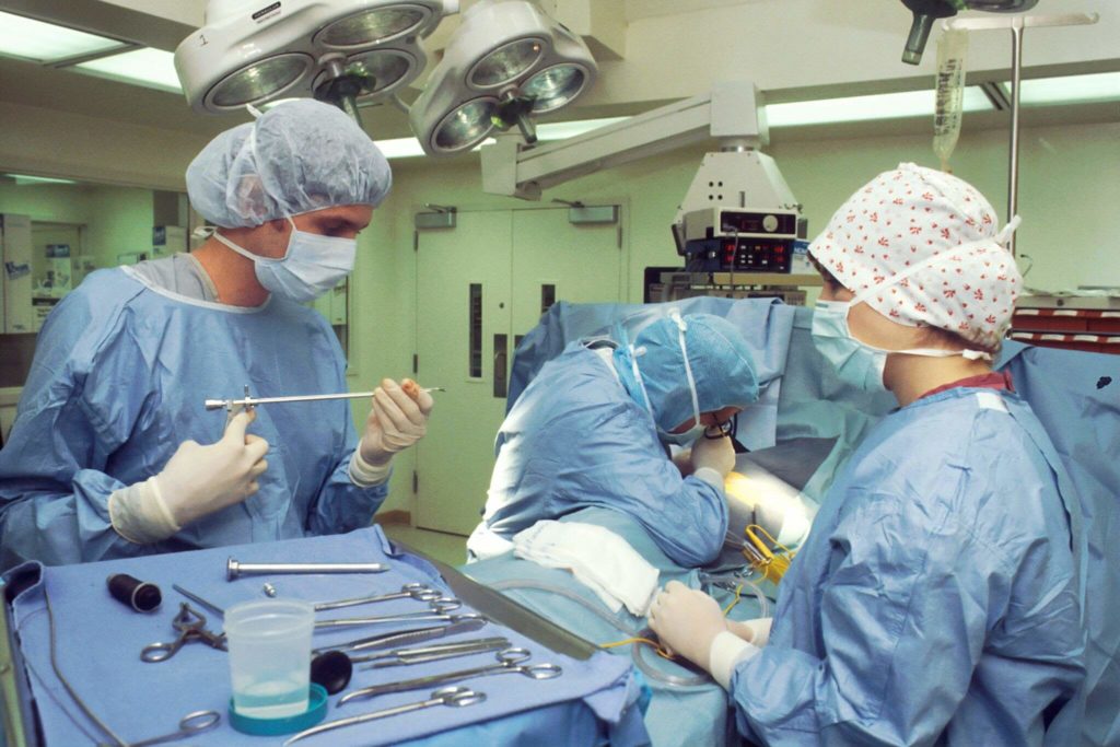 Surgeons working in an emergency room